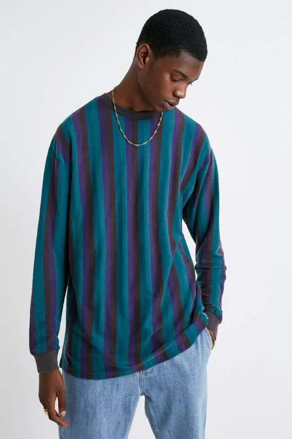 Man with long sleeved striped shirt