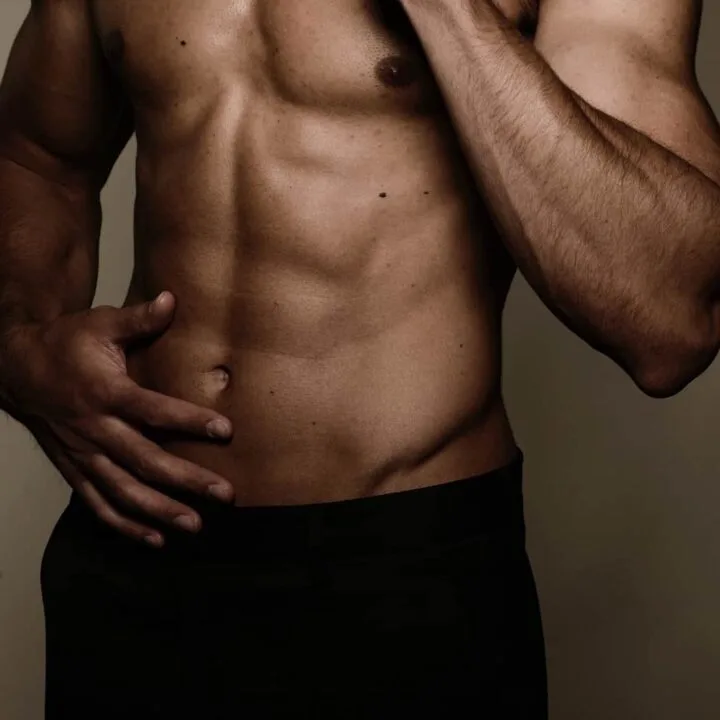 man with a six pack wearing black underwear