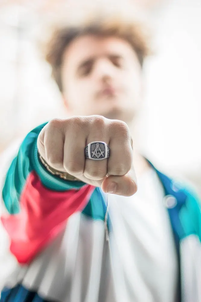 man showing off ring